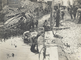 Canadian Engineers Repair a Bridge Destroyed by the Germans