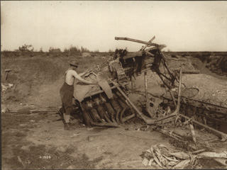 A Canadian Soldier Using What Remains of a German Plane as Clothes Horse, [ca. 1918]