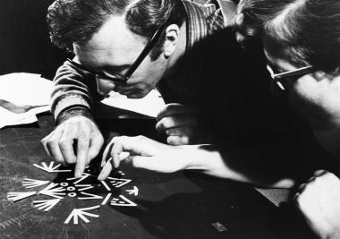 Norman McLaren and his assistant Evelyn Lambart work on the animation of the 