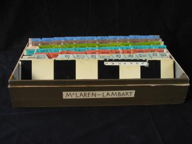 Box containing 73 square wave cards used in the production of synthetic music on film stock.
