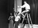Off-camera, people pull on the invisible nylon line used to animate the chair.