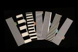 Square wave cards used in the production of synthetic music on film stock.
