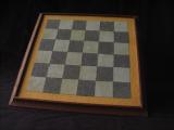 Reproduction of the checkerboard used in the making of the 1964 film Canon.