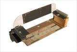 Small table designed and built by Norman McLaren for the production and recording of synthetic music on film stock using the sound card method.