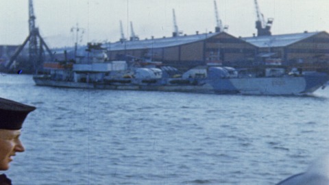 Colour footage : Shot of LCL-263 moving out of harbour, of LCL-299 moving out on the way to France, landing craft is loaded with Canadian Army personnel. Shots of landing craft assaults and landing craft tanks leaving harbour with part of invasion fleet in background (06/06/1944 or 07/06/1944).