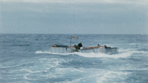 Colour footage : Two landing crafts bobbing in ocean like corks, good sequence showing them bucking heavy seas (06/06/1944 or 07/06/1944).