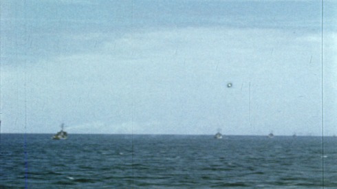 Colour footage : Shots of crew, setting and hauling in buoys and more shots of minesweepers (06/06/1944 or 07/06/1944).